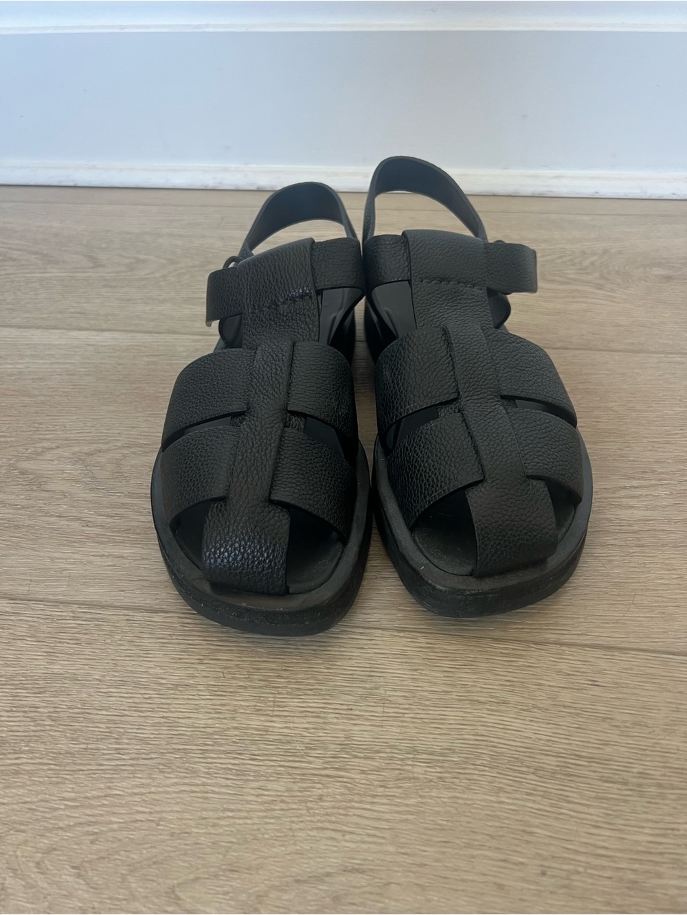 The Row Black Leather Fisherman Sandals